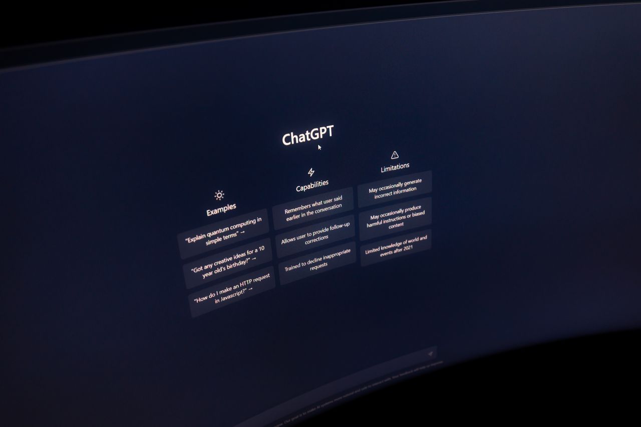 home-hero Close-up of a computer screen displaying ChatGPT interface in a dark setting.